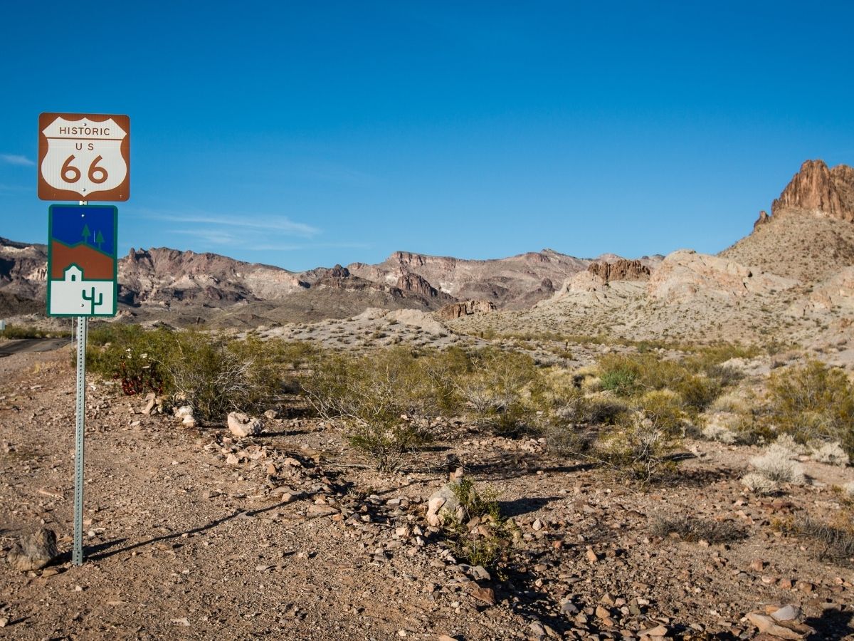 Route 66 road sign in Arizona desert