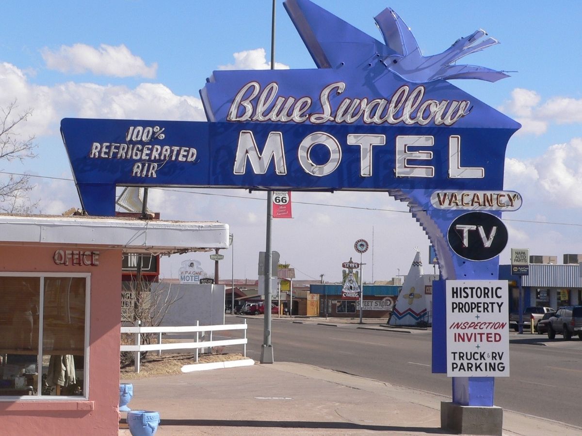 Blue swallow motel in daytime