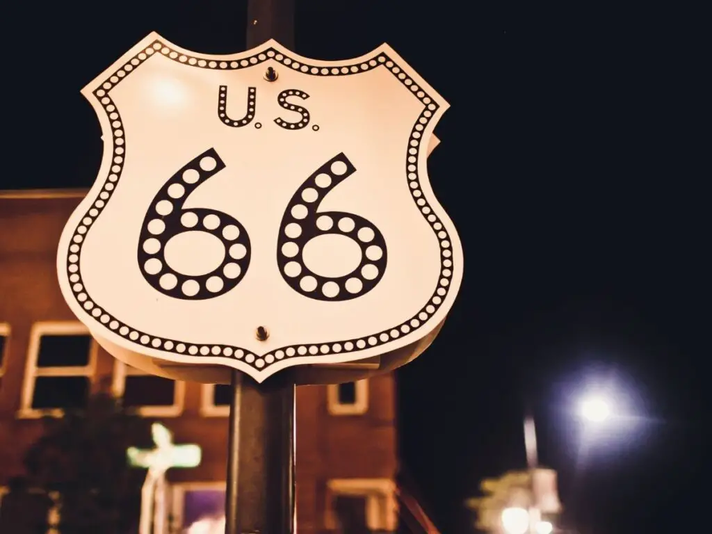 Route 66 road sign at night